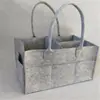 Bolsa de pañales de fieltro transfronteriza bolsa de almacenamiento de fieltro bolsa de gran capacidad almacenamiento de cosméticos bolsa organizadora fabricantes stock