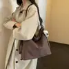 Bolso tote texturizado vintage de alta gama para mujer, nuevo modelo 2026, bolso de hombro casual simple, mochila versátil y elegante