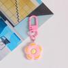 Llavero con forma de flor pequeña de resina colorida para mujer, estilo Ins, bonito colgante para bolso, accesorio para colgar auriculares, decoración para bolso.
