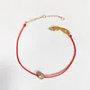 Este año pulsera de cordón rojo cobre rojo calabaza festiva bolsa de dinero oro rosa femenina acero de titanio retención de color regalo de Tanabata