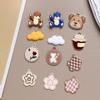 Colgante de aleación con forma de oso de dibujos animados y flor, hecho a mano, para manualidades, collar, pendientes, llavero, accesorios, material
