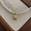 Colar feminino de pérolas de água doce retrô simples europeu e americano, com estrela geométrica de cinco pontas e zircônia incrustada, corrente de clavícula dourada
