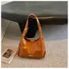 Bolso de Mano Retro para Viajes Diarios de Cuero Encerado Transfronterizo Nuevo Diseño Pequeño de Nicho para Mujer Bolso HOBO Retro Bolso de Hombro Versátil