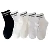 Calcetines para niñas Yishuangshuang, nuevos calcetines de otoño e invierno con forma de corazón de dibujos animados hasta la mitad de la pantorrilla, algodón peinado, calcetines estilo Miu con letras y caras sonrientes para estudiantes