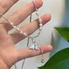 Collar de Mariposa con Cuentas de Plata Rota Estilo Nuevo 2026 Sensación de Alta Gama Viaje a la Costa Lujo Ligero Cadena para Clavícula de Nicho Accesorio