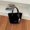 Bolso tipo cubo estilo retro para mujer, nueva colección otoño 2026, diseño coreano simple y casual, alta calidad, bolso de hombro de color liso