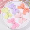 Otoño e Invierno color caramelo dulce lindo lazo DIY tocado accesorios para el cabello pasador femenino material al por mayor para accesorios de funda de teléfono