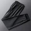 Calças Esportivas Masculinas Verão Fino Gelo Seda Malha Secagem Rápida Calças Elásticas Calças Casuais Folgadas Respirável Ar Condicionado Tamanho Grande