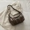 Bolso de mano de moda nuevo y elegante con tachuelas de gran capacidad 2026 para mujer, adecuado para llevar al hombro, cruzado o debajo del brazo