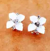 E141 Pendientes Coreanos Pendientes Flor de Camelia Moda Coreana para Mujer Azul Real Pinzas para Orejas Escarchadas Tridimensionales Pequeños Accesorios Venta al por Mayor