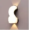 2024 creativa nueva lámpara de pared LED emisora de luz nórdica habitación dormitorio pared de fondo lámpara de pared impermeable exterior venta al por mayor