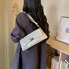 Bolsas de Diseño de Nicho Transfronterizas para Mujer 2026 Nueva Moda Bolsos Versátiles para Mujer Bolsos de Hombro Retro para Mujer