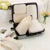 Set de cinco piezas de almacenamiento para viajes multiestilo, bolsa de almacenamiento portátil de tela Oxford con patrón de diamante impermeable