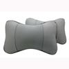 Venta al por mayor de fábrica almohada de cuero para reposacabezas de coche almohada de cuero para el cuello almohada de piel de vaca almohada de hueso suministros para coche con logo de mapa