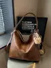 Bolso de Hombro Único de Alta Gama Transfronterizo 2026 Nuevo Color Sólido Simple Moda Versátil Chic Moderno Mochila para Viajes de Negocios