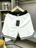 Shorts de corte holgado, con bloques de color, de longitud hasta la rodilla para hombre, nuevo estilo de verano, transpirables y de secado rápido, adecuados para correr, deportes, baloncesto, entrenamiento y fitness