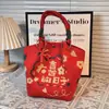 Design de Nicho Bolsa de Mão Vermelha com Padrão para Casamento Bolsa de Presente Festiva em Lona Saco de Balde de Mão com Estampa de Natal Ano Novo