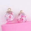 Venta al por mayor de fábrica Nueva bola de cristal de estrellas luminosas DIY teléfono móvil coche bolsa llavero decoración colgante artesanías