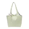 El popular bolso tote de estilo dulce de este año para mujer es el nuevo modelo de verano 2026 con adornos de estrellas, bolso de hombro y bolso de axila de moda