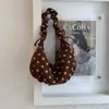 Bolsa de bolinhas feminina 2026 novo estilo bolsa de ombro bolsa de ombro única para trabalho de alta qualidade bolsa de bolinho retrô bolsa feminina
