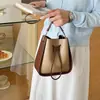 Bolso bandolera tipo cubo de tela de lunares de moda estilo coreano para mujer, nuevo bolso de hombro para el verano 2026, nicho dulce y elegante, para el día a día
