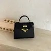 Bolso Tote Pequeño Súper Caliente Esenciales de Oficina para Mujer 2026 Nuevo Otoño Bolso de Mano Cuadrado Pequeño Cruzado de un Solo Hombro para el Trabajo