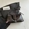 Bolso de axila elegante, moderno y versátil para mujer, nuevo bolso de mano casual simple, bolso de hombro retro de nicho