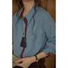 Camisa solighter feminina com blocos de cor retrô francesa e listras verticais, novo estilo primavera 2026, top escovado de manga longa