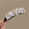 Pinza de plátano de moda y elegante para mujer, versátil para el uso diario, pinza para el pelo de lunares de alto valor, accesorio para el pelo de pinza de garra de lazo de estilo coreano simple