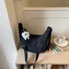 Bolso cruzado tipo bolsa de dumplings para mujer, bolso de gran capacidad para el trabajo, mochila casual simple nueva 2026, bolso de hombro
