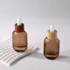 Botella de vidrio ámbar con gotero para sérum de 30 ml, tapa de madera de bambú personalizada de alta gama, para cuidado de la piel y del cabello, aceite esencial, OEM