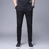 Calças casuais masculinas outono masculino plus size cor sólida comprimento no tornozelo amarradas no tornozelo verão calças esportivas largas secagem rápida calças masculinas
