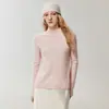 Suéter de estilo minimalista 100% cachemira pura para mujer, con cuello alto, mangas largas, un diseño ligero y elegante, perfecto para usar en capas y mantenerse abrigada.