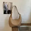 Bolsa de Mão Retro de Moda de Alta Qualidade Transfronteiriça Bolsa Dumpling para Mulheres 2026 Nova Bolsa de Ombro de Nicho Versátil Bolsa de Axila