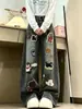 Pantalones de mezclilla lavados con bordado de toalla de dibujos animados Chao Li Youhuo para mujer, estilo de calle alta de otoño, holgados, de pierna ancha, hasta el suelo
