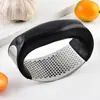 Venta al por mayor de fábrica anillo acero inoxidable prensa de ajos herramientas de cocina pelador de ajos puré de ajo manual suministro puntual transfronterizo