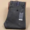 Otoño e invierno Nuevos pantalones casuales de lana para hombre fibra de poliéster elástico cálidos gruesos rectos de cintura media pantalones de lujo para hombre