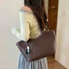 Bolsa de hombro tejida de gran capacidad para mujeres jóvenes, versátil para el uso diario, estilo coreano, verano, nueva bolsa de oficina 2026