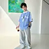 Camisa de Rayas Finas para Niños 2026 Verano Nuevo Diseño de Panda Casual Transpirable 100% Algodón para Niños Mayores