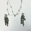 Diseño de nicho sentido de alta gama pendientes de borla con lentejuelas metálicas para mujer moda de lujo ligero combinan con todo nuevos pendientes de moda 2025