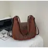 Bolsa Tote Tendência de Grande Capacidade para Mulheres Deste Ano 2026 Nova Retrô Casual Versátil Bolsa para o Dia a Dia Bolsa de Ombro de Alta Qualidade