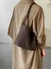 Bolsa balde texturizada vintage estilo coreano transfronteiriça, novo modelo outono 2026, bolsa de ombro e axila simples e de nicho para o dia a dia