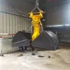 Baldes concha são fáceis de instalar e têm uma ampla gama de usos, incluindo para limpeza de rios e coleta de lama.