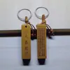 Chaveiro de Madeira de Pessegueiro Pilar Quadrado Sutra do Diamante Chaveiro Cilíndrico Sutra do Coração Mantra Surangama Venda por Atacado de Vendedores de Rua Cabacinha