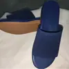 Sandalias de estación independiente 2022 primavera y verano nuevas de punto con plataforma 36-43 talla grande chanclas planas para mujer Venta al por mayor