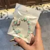 Libro Caperucita Roja Mismo Estilo Estudiante Pulsera de Glaseado de Palomitas de Maíz Hecha a Mano con Cuentas Dibujos Animados Cristal Pulsera Infantil Venta al por Mayor Cajas de Regalo