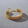 Diseño Personalizado de Nicho Europeo y Americano Metal de Alta Calidad Chapado en Cobre Oro Real de 18K Esmalte de Colores Popular Calado Pulsera de Moda