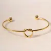 Lele Jewelry Pulsera Abierta de Corazón Nudo Simple Estilo Coreano de Moda Personalidad Temperamento Joyería Popular de Venta Caliente Europea y Americana