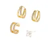 Brincos de Clipe Argola Dupla Vazada Minimalista Transfronteiriços Europeus e Americanos com Trevo de Quatro Folhas Cravejado de Diamantes, Design Elegante e Compacto