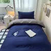 2026 Nuevo Modelo Color Sólido Dos Tonos Cama Individual para Estudiante Juego de Tres Piezas Cama Litera de Dormitorio Funda de Edredón Individual Funda de Edredón Pieza Única